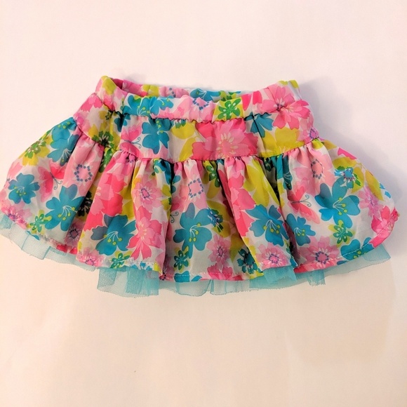 Disney Other - DISNEY Ruffle Skirt With Bright Flowers